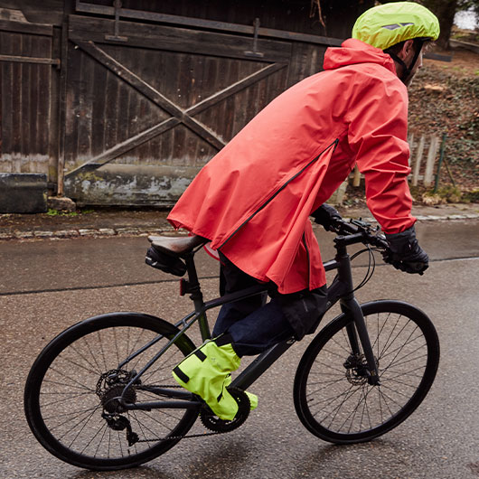 Outdoorkleding voor heren: Op de fiets bij weer en wind