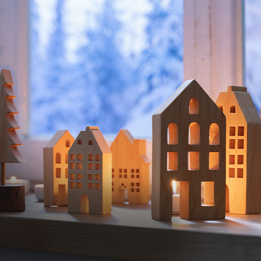 Verlicht houten kerstdorp